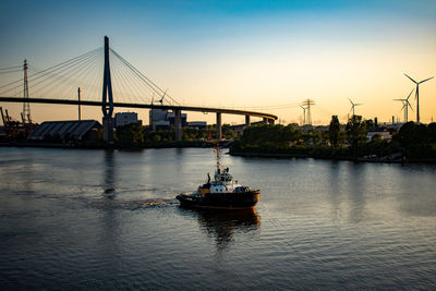 View of bridge over river against sky