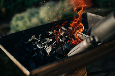 Lighting up coal for barbecue