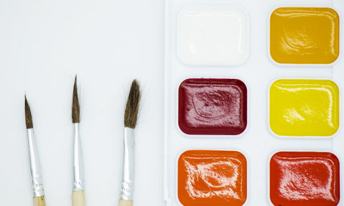 High angle view of candies on white table