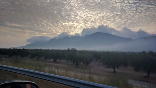 View of landscape against cloudy sky