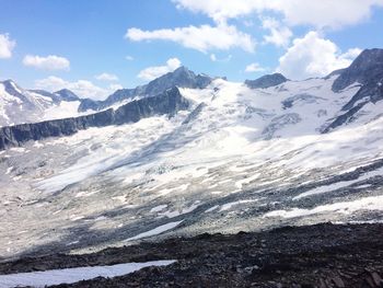 Scenic view of snowcapped mountains against sky