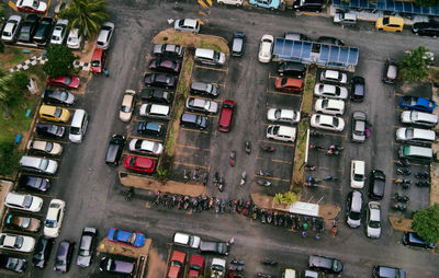 High angle view of traffic on road by buildings