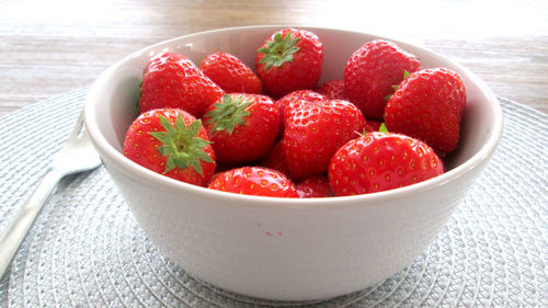 Close-up of strawberries in bowl on table