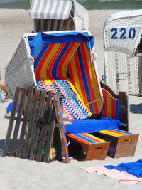 Multi colored chairs on beach