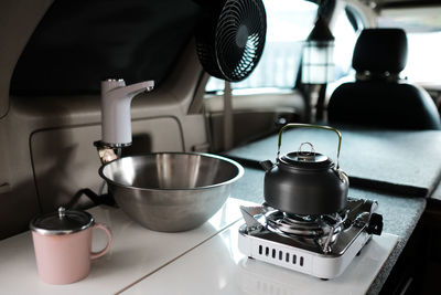 Still life of a cooking set in a campervan