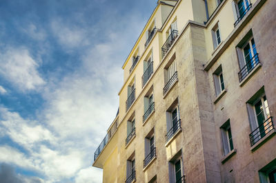 Low angle view of residential building against sky