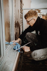 Man working on wood