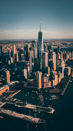 High angle view of buildings in city against sky