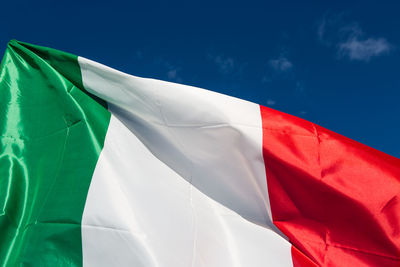 Close-up of italian flag against sky