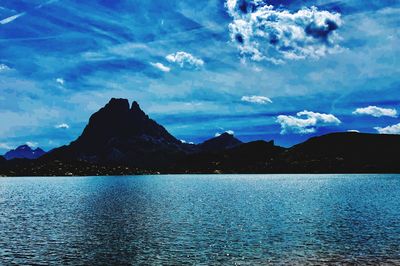 Scenic view of lake against blue sky