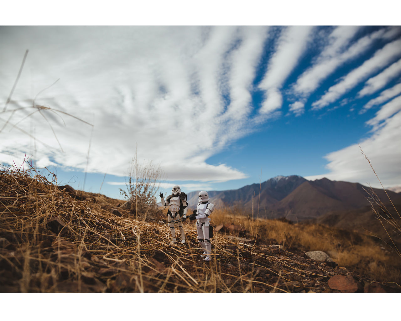 tranquil scene, auto post production filter, grass, sky, plant, tranquility, mountain, landscape, cloud - sky, cloud, nature, non-urban scene, scenics, beauty in nature, day, outdoors, cloudscape, solitude, remote, blue, mountain range