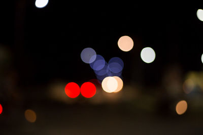 Defocused image of illuminated lights at night