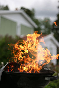 Close-up of flame on barbecue grill