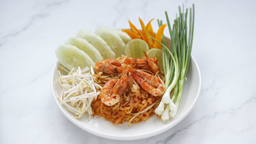 Close-up of noodles served in plate on table