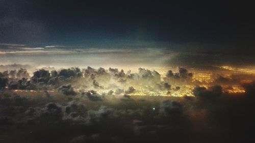 Low angle view of trees against sky during sunset