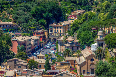Overview of portofino town area with traditional colourful houses, view from castello brown, italy