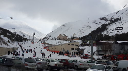 Panoramic view of ski lift against sky