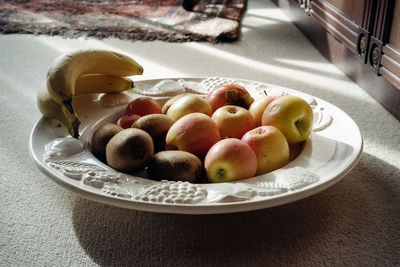 High angle view of fruits in bowl on table