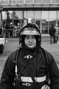 Portrait of man standing on street during winter