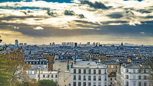 Cityscape against sky during sunset