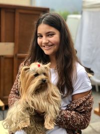 Portrait of woman with dog