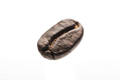 High angle view of bread against white background