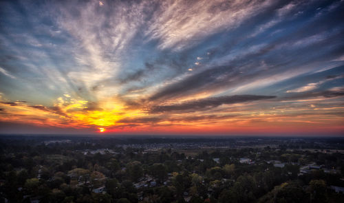 Aerial view of city during sunset