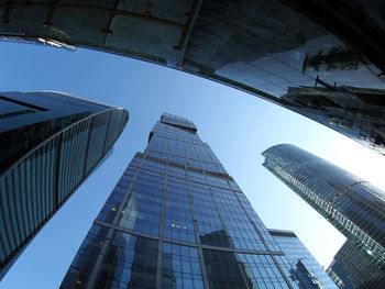 Low angle view of building against blue sky