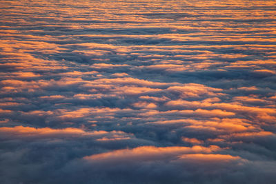 Low angle view of clouds in sky during sunset