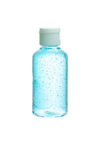 Close-up of blue bottle against white background