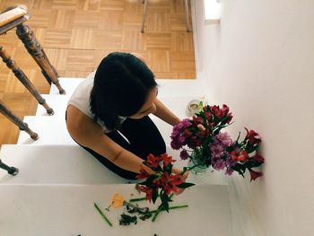 Close-up of woman holding flowers