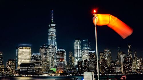 Illuminated buildings in city at night