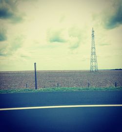 View of calm sea against cloudy sky