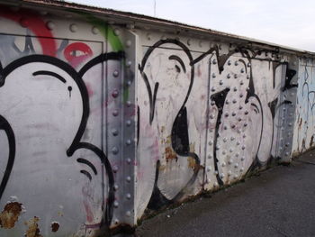 Close-up of graffiti on metal structure