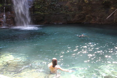 Woman swimming in water