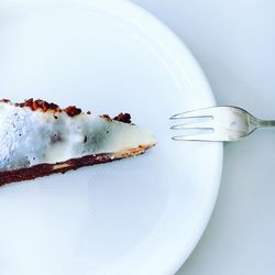 Close-up of white object over white background