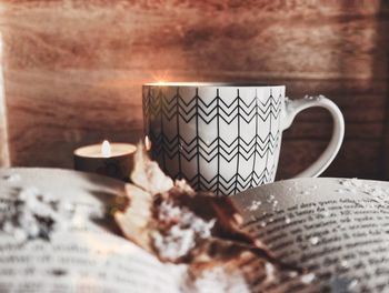 Close-up of coffee cup on table