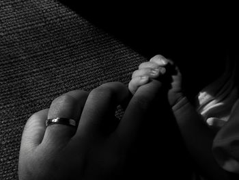 Close-up of couple hands