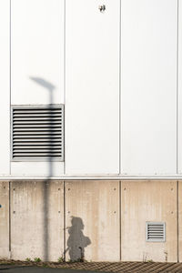 Shadow of window on white wall