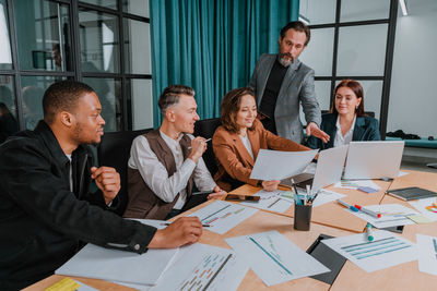 Business colleagues working in office