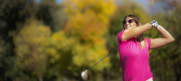 Lady golfer in a golf swing position