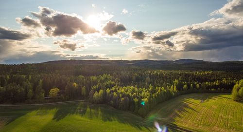 Scenic view of landscape against sky during sunset