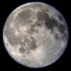 Low angle view of moon against sky