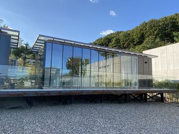 View of modern building against blue sky