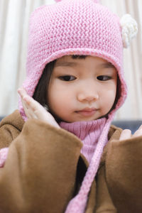 Close-up of cute girl at home