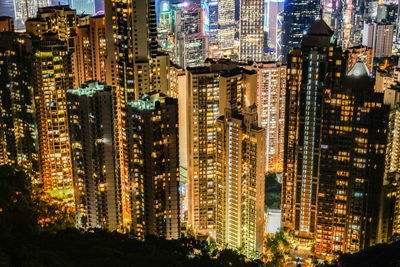 Aerial view of buildings in city at night