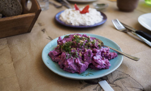 Close-up of beetroot salad served in plate on table