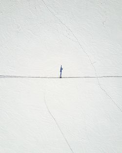 High angle view of man skiing on snowcapped mountain