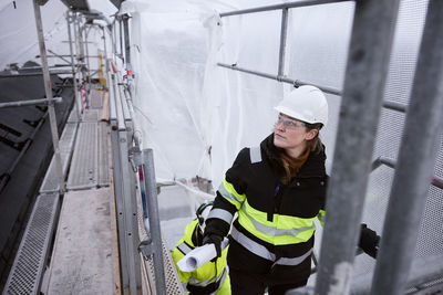 Engineer walking at building site