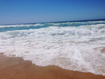 Scenic view of sea against clear sky